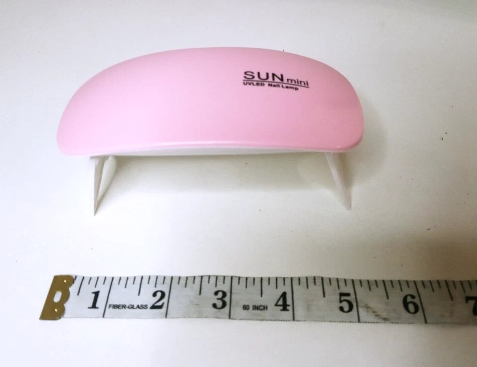 6 watt mini foldable nail lamps with power USB cord and kiss decal to decorate it with!
