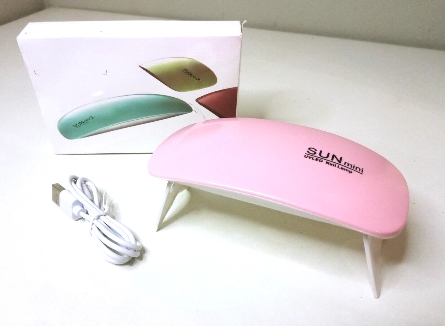 6 watt mini foldable nail lamps with power USB cord and kiss decal to decorate it with!