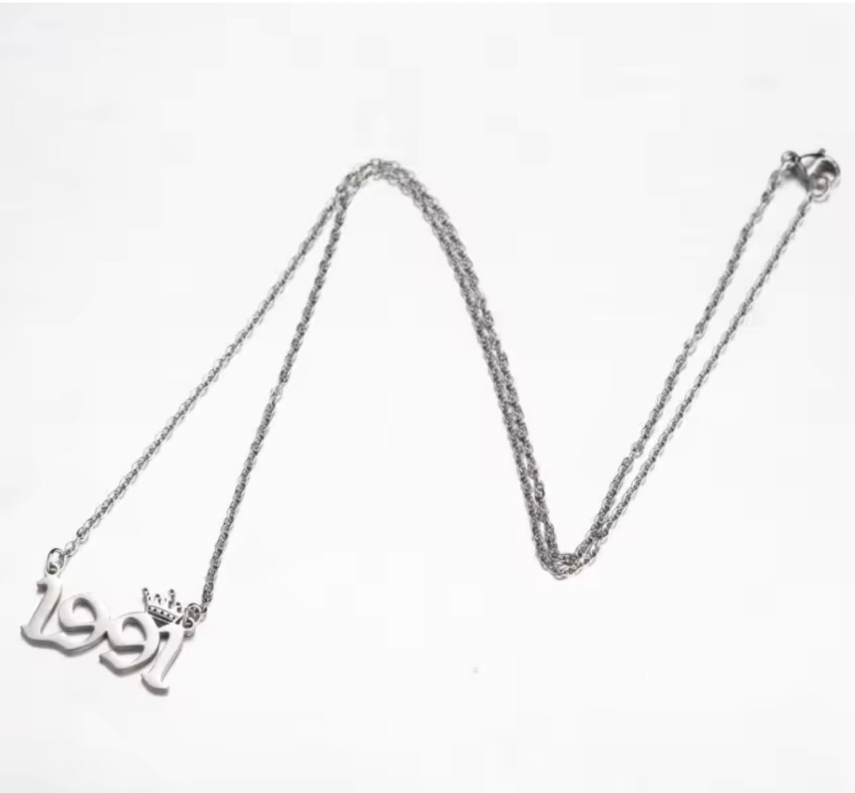 FAB birth year nameplate style necklaces 18 inch. Stainless steel plated.