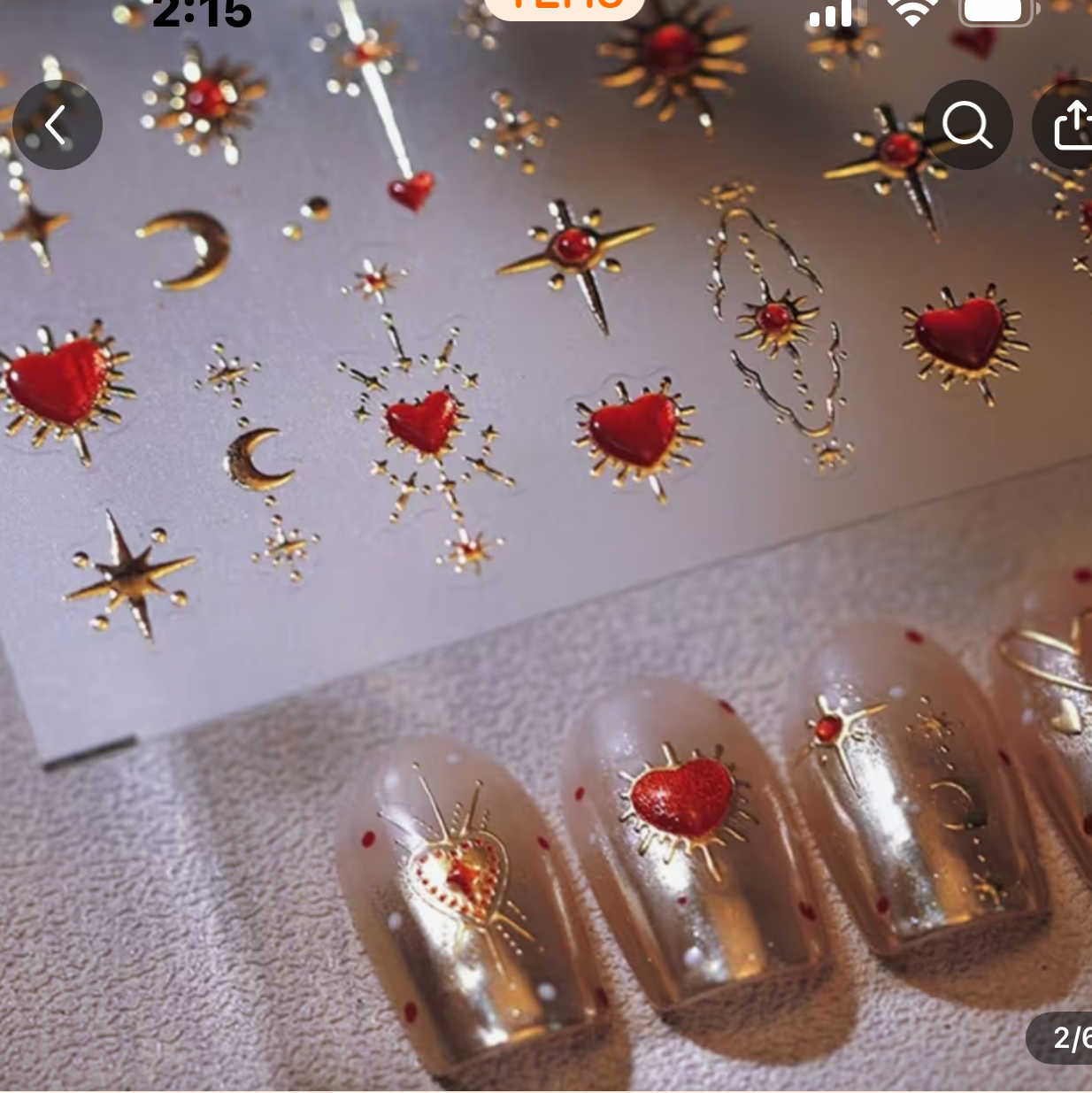 Product listing for shattered heart nail charm stickers on a shopping app interface.