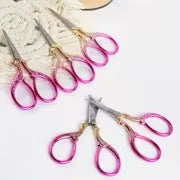Mini Manicure Scissors in a FAB magenta pink color