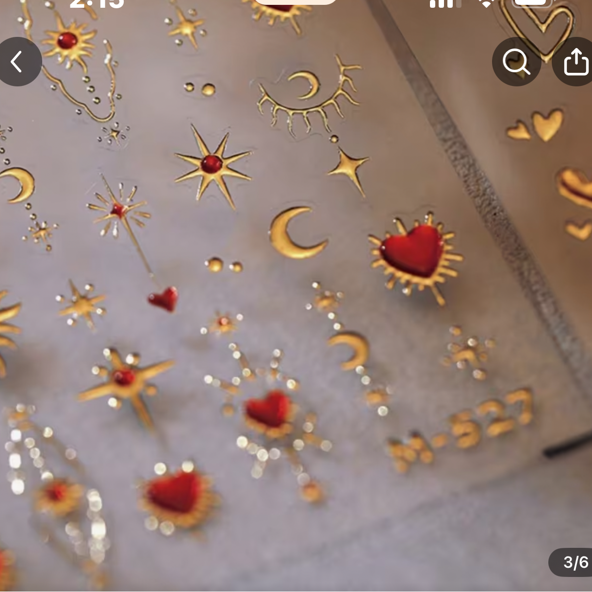 Product listing for shattered heart nail charm stickers on a shopping app.